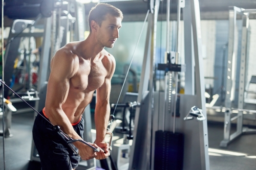Intensive Training of Handsome Bodybuilder